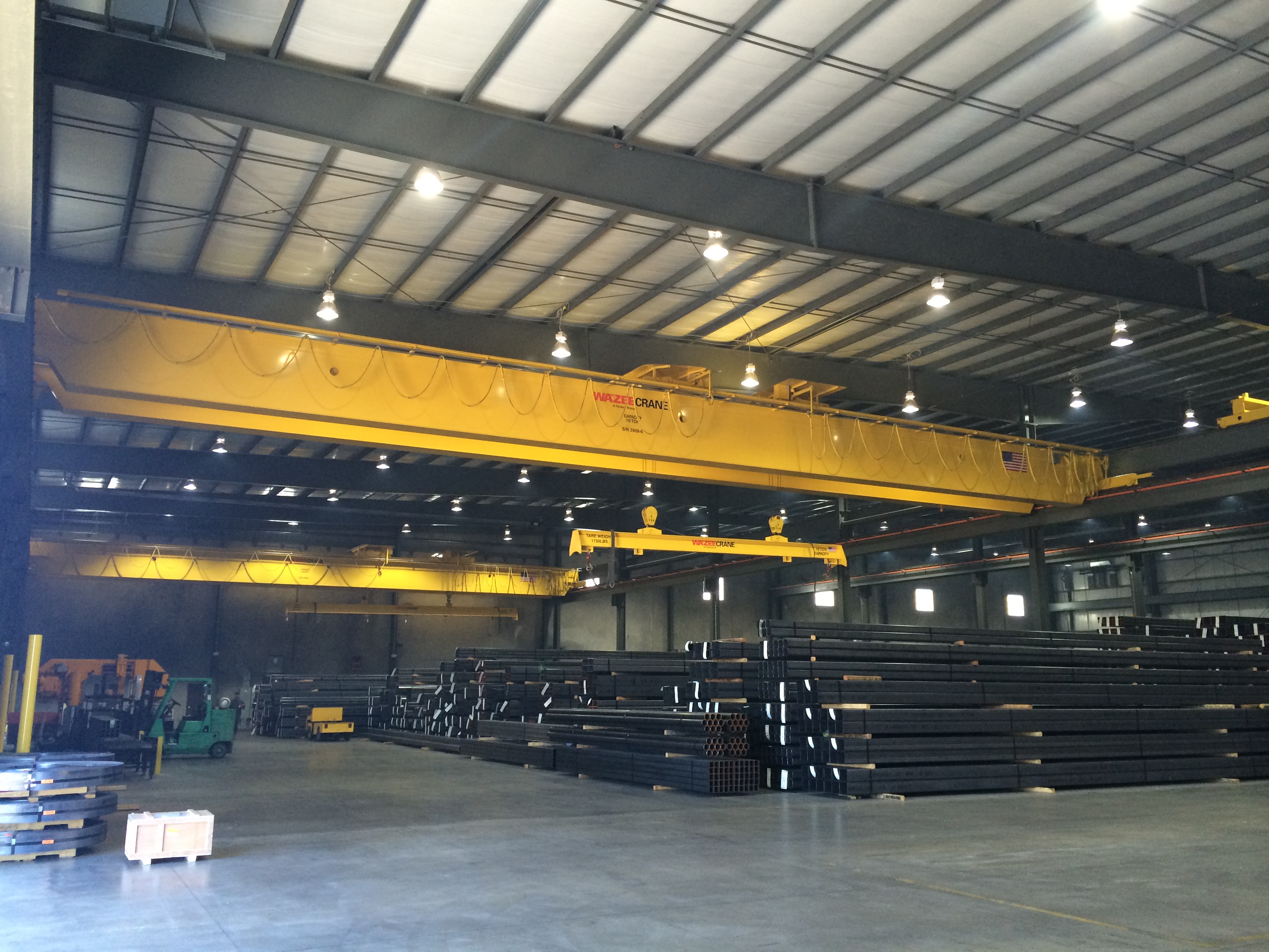 Two 10-ton, 60’ Span Double Girder Cranes with Dual 5-ton Hoists and Custom Built Spreader Beams